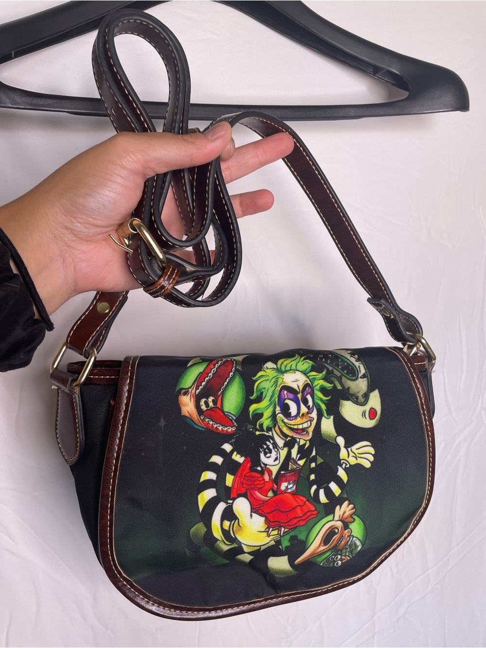 Disney Beetlejuice crossbody bag with graphic of Beetlejuice and his dog